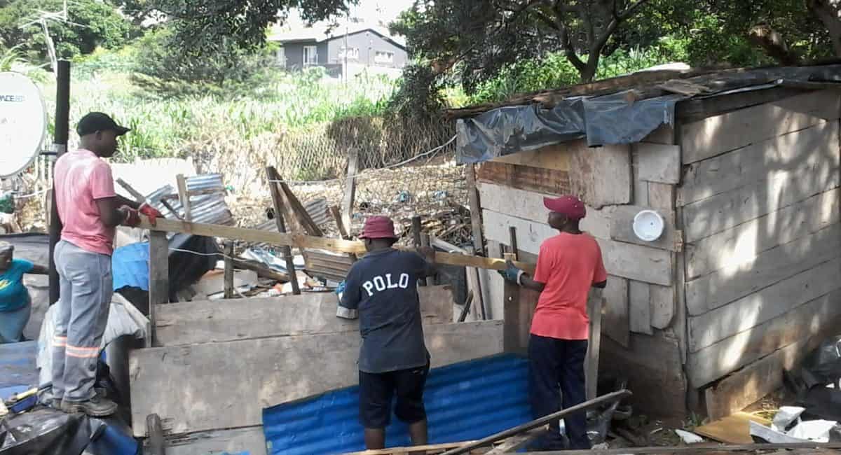 Woman allegedly shot during shack demolition