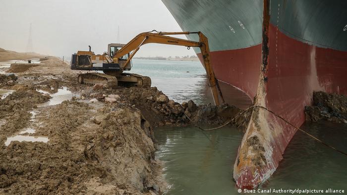 Container ship blocking Suez Canal partially refloated