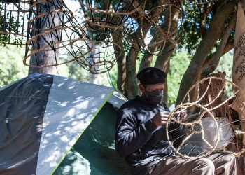 Homeless man creates unique lampshades from recycled material